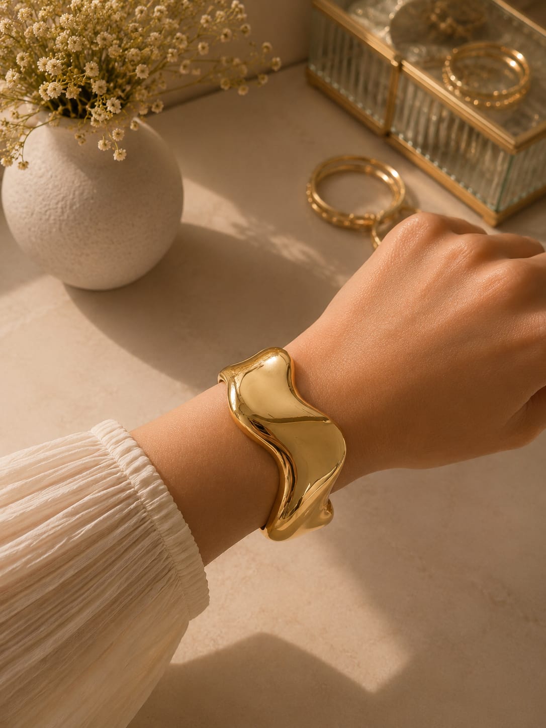 Élan Wave bangle – Gold