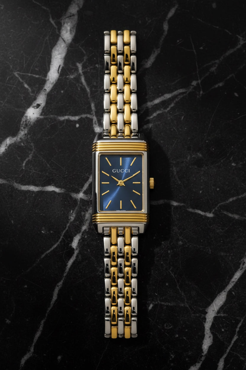 vintage Gu-cci mix silver x gold with blue dail.